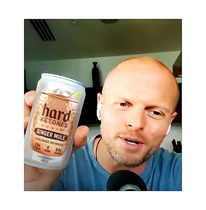 Man holding can of Ketohol - Ginger Mule Concentrate - 17g Ketohol - 0% Alcohol by Hard Ketones, New Arrivals collection