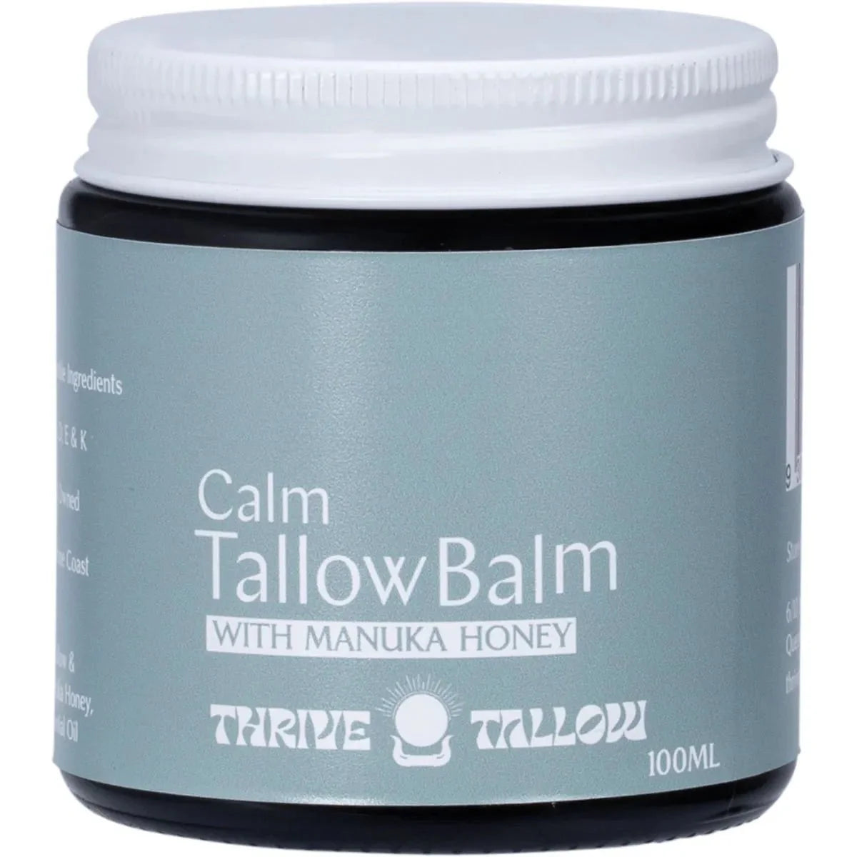 Calm Tallow Balm - 100ml by Thrive Tallow in dark jar with white lid featuring skincare balm label and manuka honey ingredient text