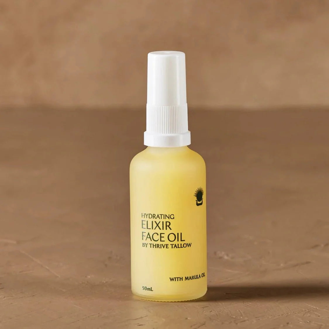 Hydrating Elixir Face Oil - 50ml by Thrive Tallow in frosted bottle with white cap, part of Body & Beauty collection