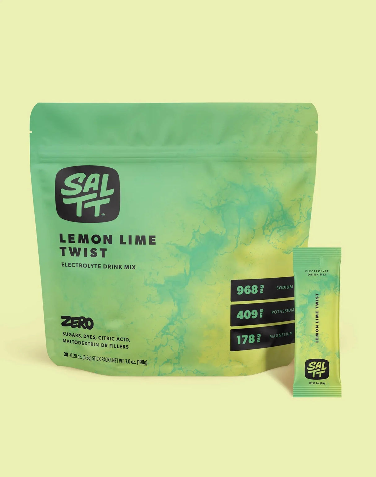 SALTT Lemon Lime Twist Electrolyte Drink Mix - 30 Sticks in green resealable pouch with individual stick pack displayed alongside