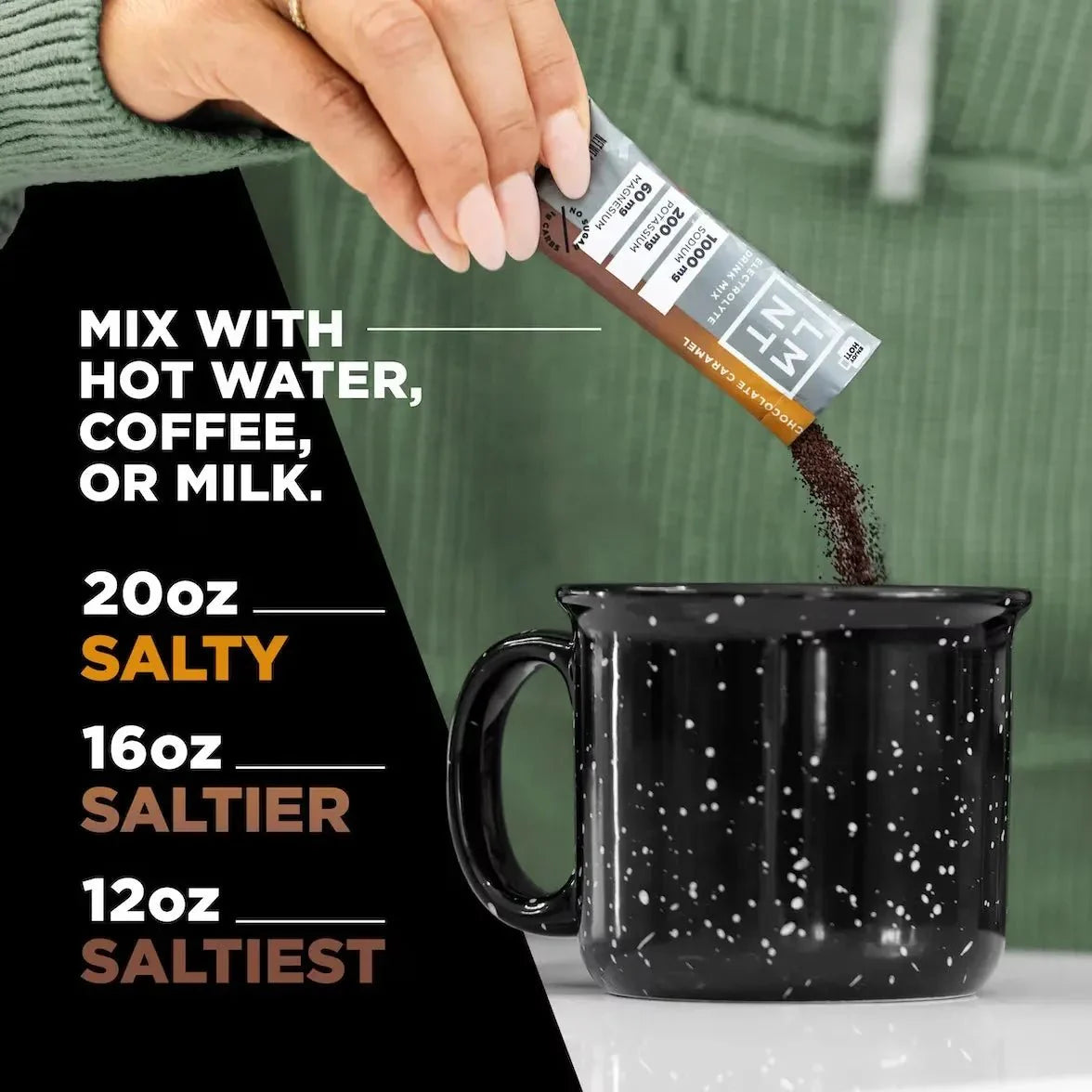 Hand holding a stick of LMNT Chocolate Caramel Electrolyte Mix - 30 Sticks pouring powder into a black speckled mug with instructions for mixing with hot water, coffee, or milk and saltiness levels by volume.