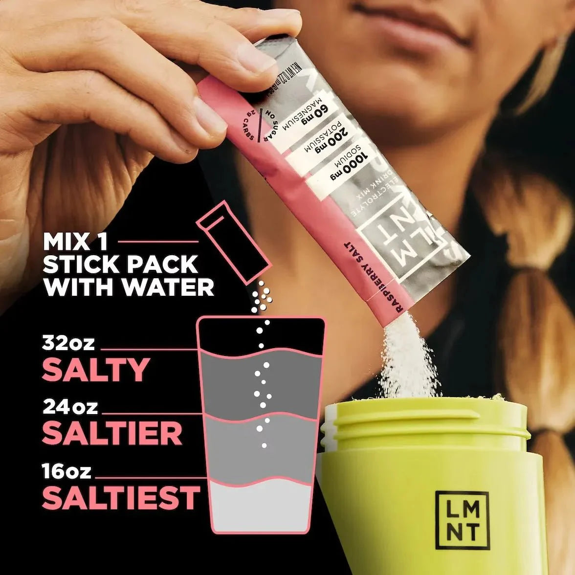 Person pouring LMNT Raspberry Salt Electrolyte Mix - 30 Sticks powder into a shaker with instructions for mixing in water and varying salt levels by LMNT, keto-friendly low carb hydration.