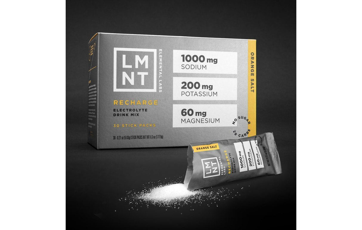 LMNT Orange Salt Electrolyte Mix - 30 Sticks box and single stick with electrolyte content details on black background