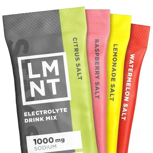 Four colorful sticks of LMNT Variety Pack - 12 Sticks electrolyte drink mix by LMNT in citrus, raspberry, lemonade, and watermelon salt flavors for keto hydration.