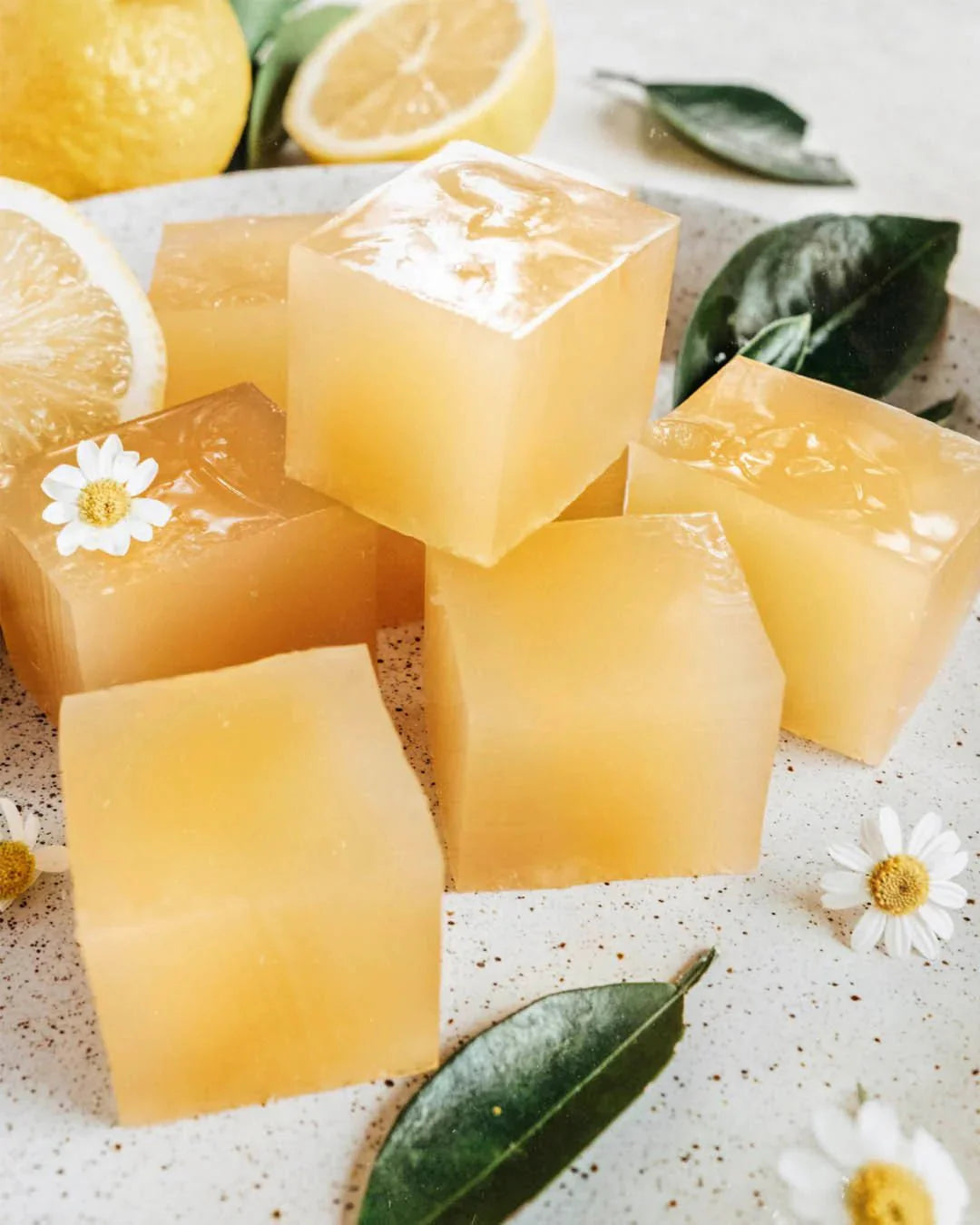 Natural Gelatin - 300g by Nutra Organics shown as translucent yellow jelly cubes with lemon and chamomile accents