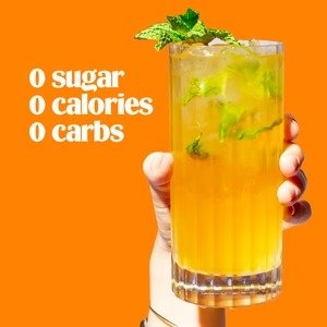 Orange Electrolyte Drink Mix - 90 Serves by Ultima Replenisher in a glass with mint, zero sugar, calories, carbs shown