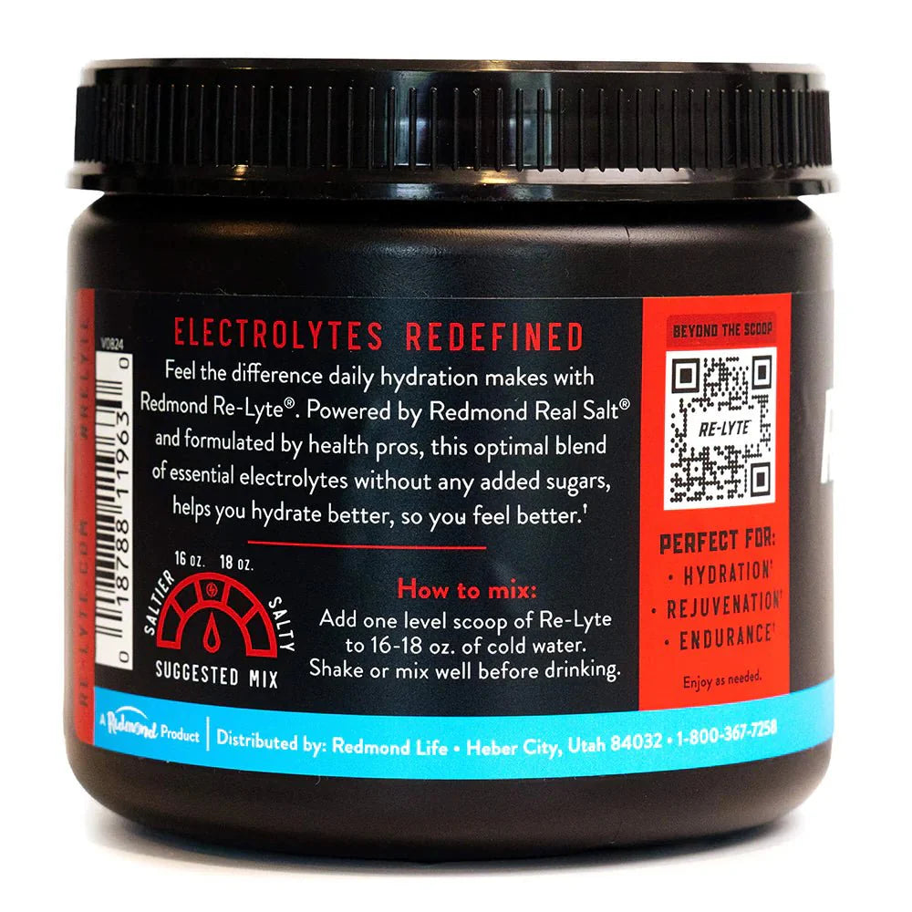 Back of Re-Lyte Electrolyte Mix - Cran Apple - Tub - 60 Serves - Limited Edition with hydration and usage info on black container