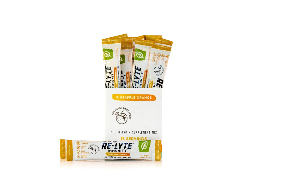Re-Lyte Immunity - Pineapple Orange - Stick Packs x 15 multivitamin supplement mix in white container with orange accents