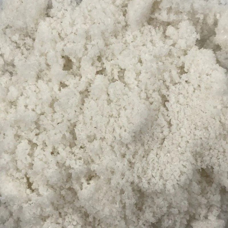 Close-up of fine textured Baja Mineral Sea Salt - Fine - 454g from Abundance Farm, part of Salt & Spice collection.