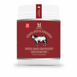 A white plastic tub of Nxsen Premium Beef Goulash with a deep red label featuring a black and white cow illustration and text reading 'Grass-Fed & Finished Freeze-Dried Ground Beef'.