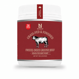 A white plastic tub of Nxsen Premium Beef Goulash with a deep red label featuring a black and white cow illustration and text reading 'Grass-Fed & Finished Freeze-Dried Ground Beef'.