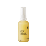Hydrating Elixir Face Oil - 50ml by Thrive Tallow in a frosted yellow bottle with white spray cap for skincare use.