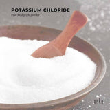 Pure Potassium Chloride Powder - 100g in wooden bowl with scoop, Orku brand for drinks and electrolytes use