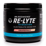 Black container of Redmond Re-Lyte Hydration Electrolyte Drink Mix Grapefruit flavor on a white background