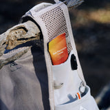 Sodii Raw Electrolyte Honey sachet in a running vest pocket