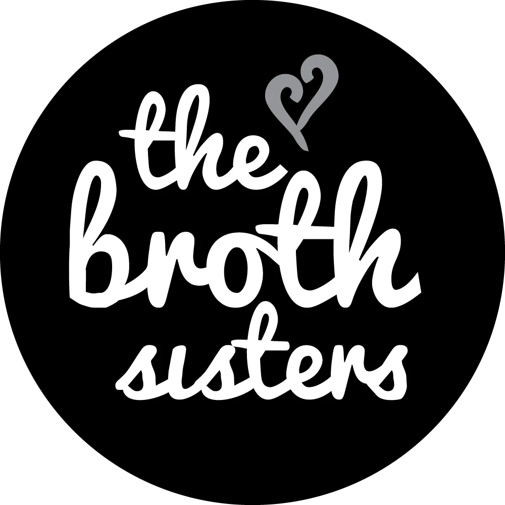 The Broth Sisters logo in white text with heart icon on black background for Superfood Mushroom Stock Concentrate - 150g