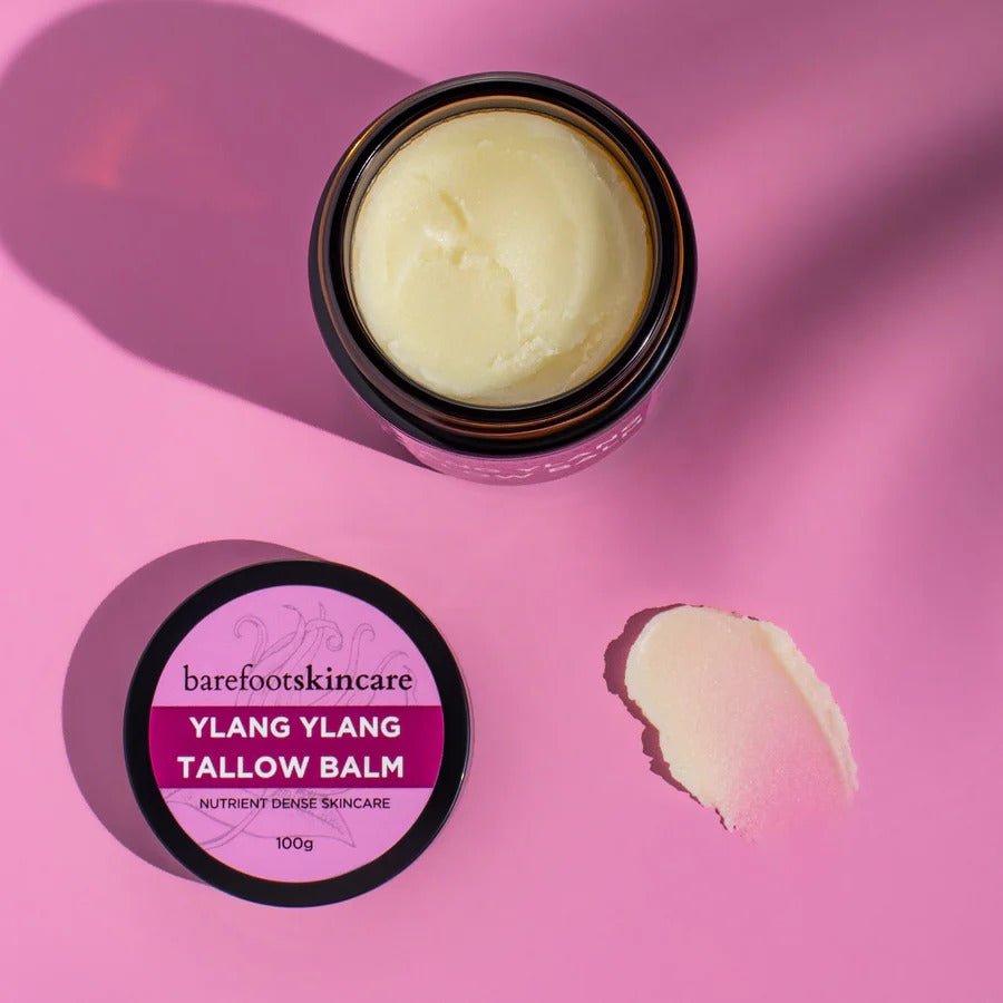 Tallow Balm - Ylang Ylang - 100g by Barefoot Skincare Co, open jar with balm and lid on pink background