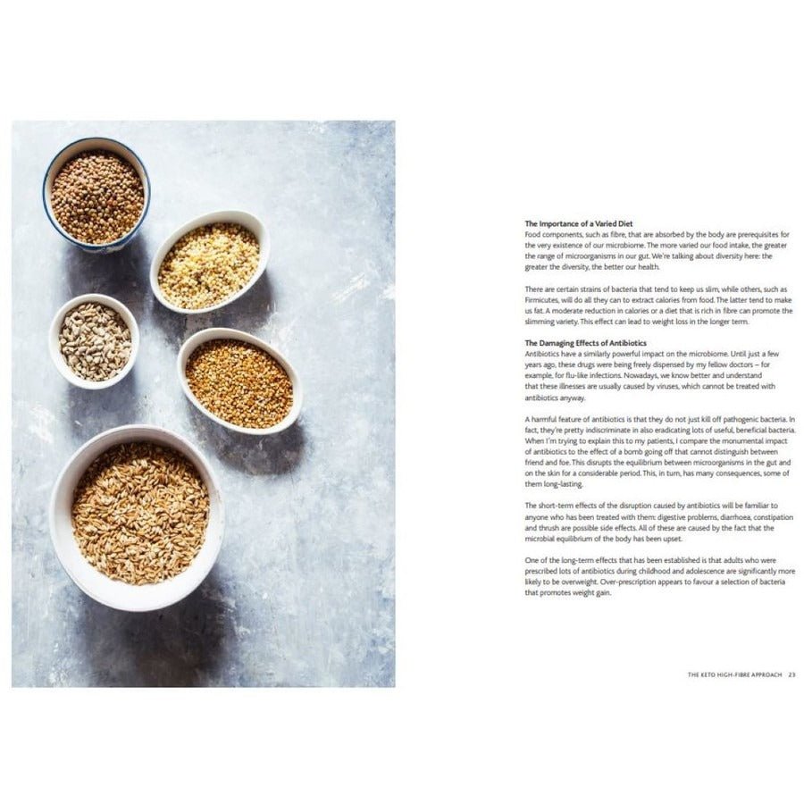 Open book spread featuring a detailed text page and four white bowls of various whole grains on a light textured surface for The 28 Day Keto High Fibre Plan by Thomas Kurscheid.